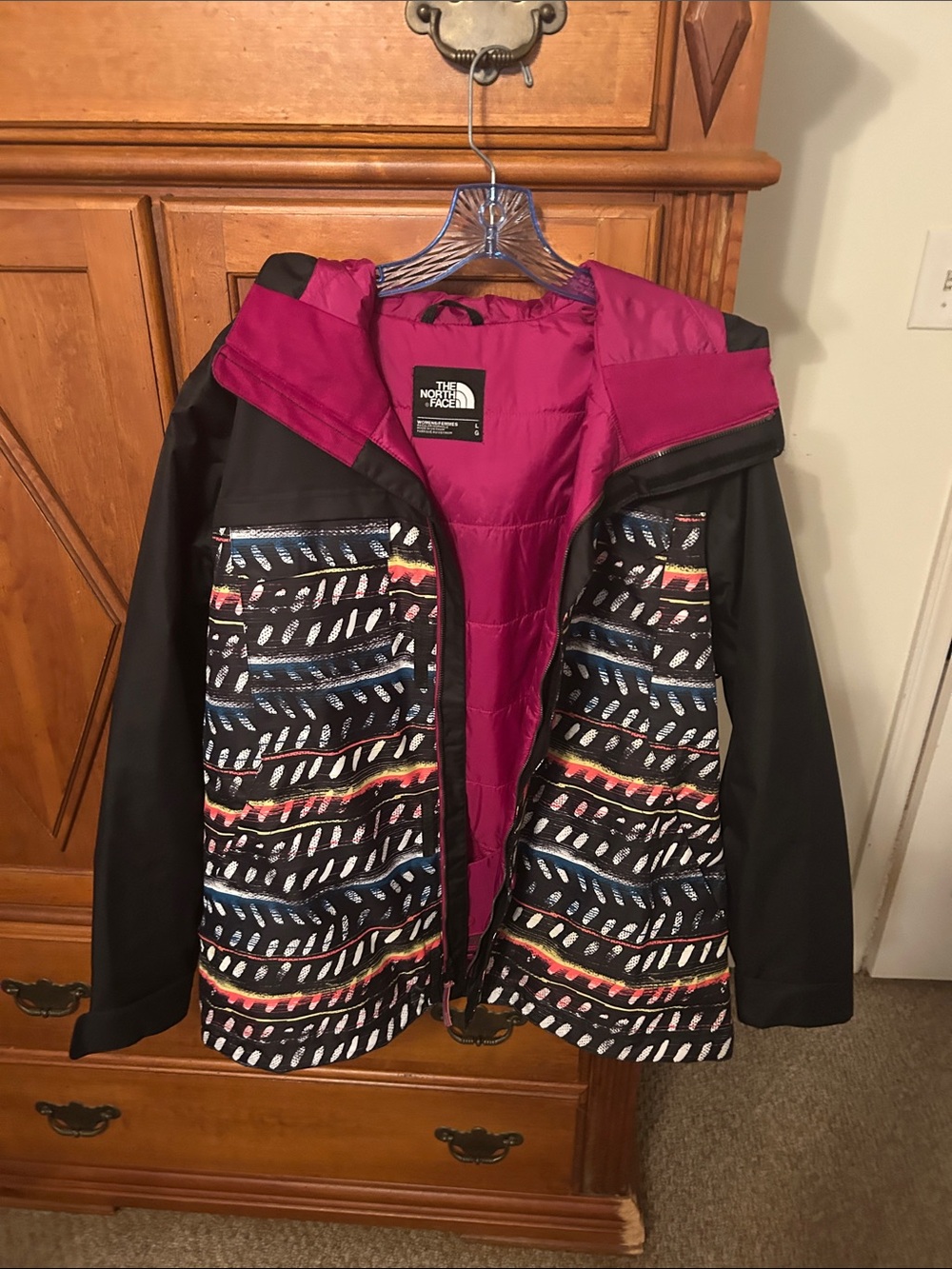 The North Face Women's Black Jacket with Pink Lining and Multicolor Print